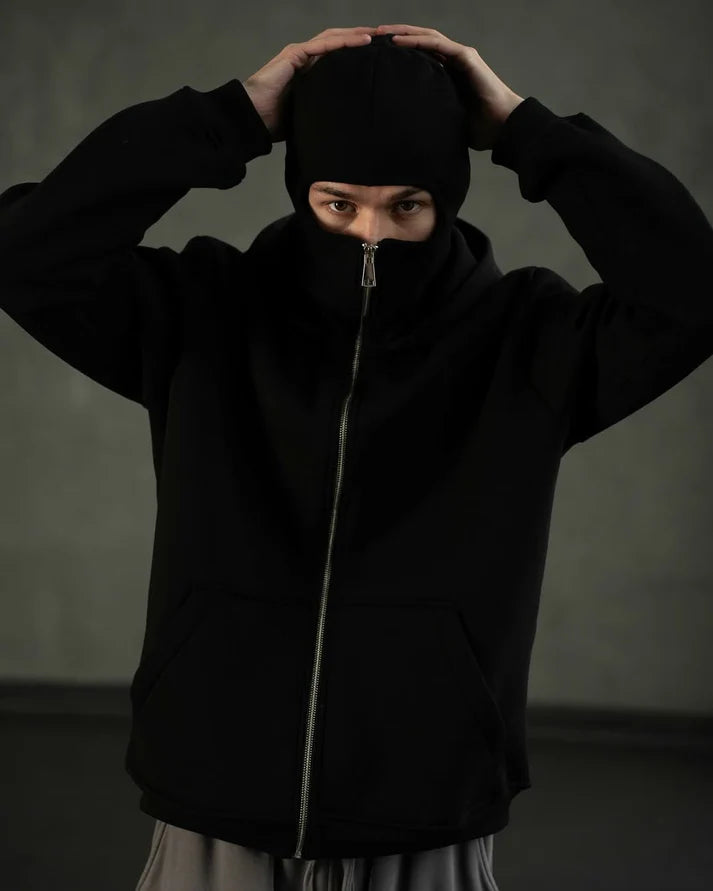 Premium Black Balaclava Ninja Hoodie with built-in face mask and warm fleece for a sleek biker-streetwear look.
