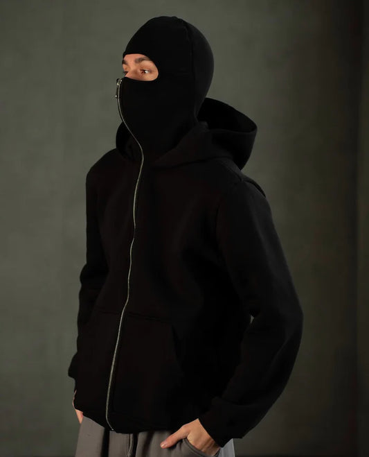 Premium Black Balaclava Ninja Hoodie with built-in face mask and warm fleece for a sleek biker-streetwear look.