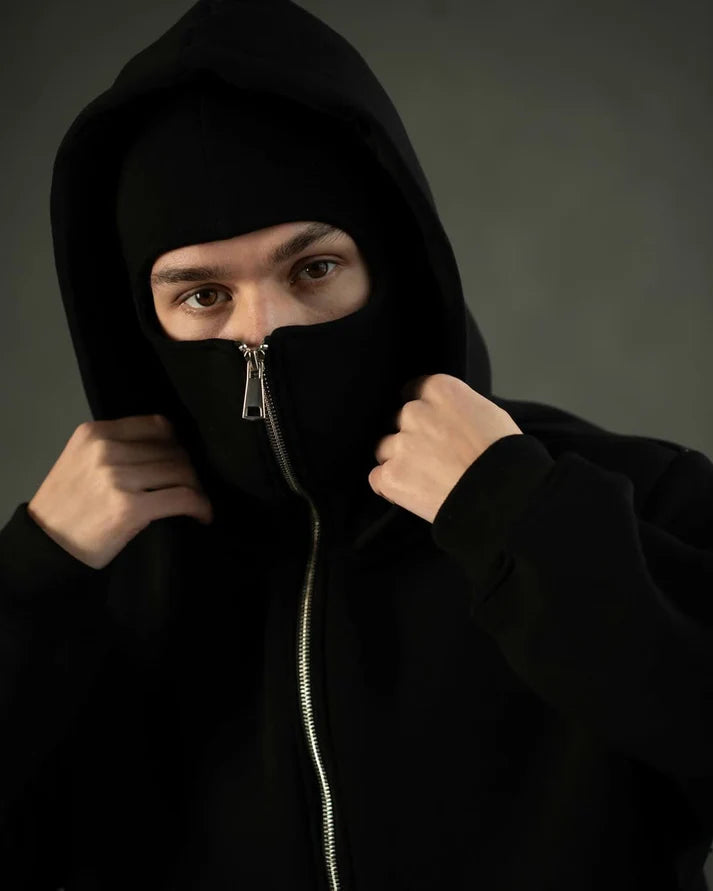 Premium Black Balaclava Ninja Hoodie with built-in face mask and warm fleece for a sleek biker-streetwear look.